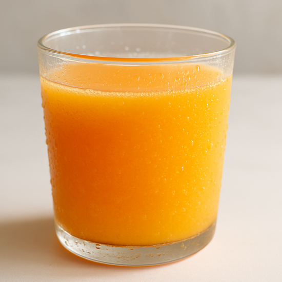A cup of fresh squeezed orange juice