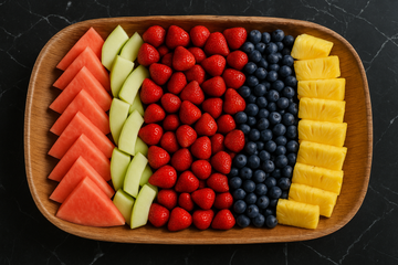 Add a row of pineapple slices with no rind/skin next to blueberries